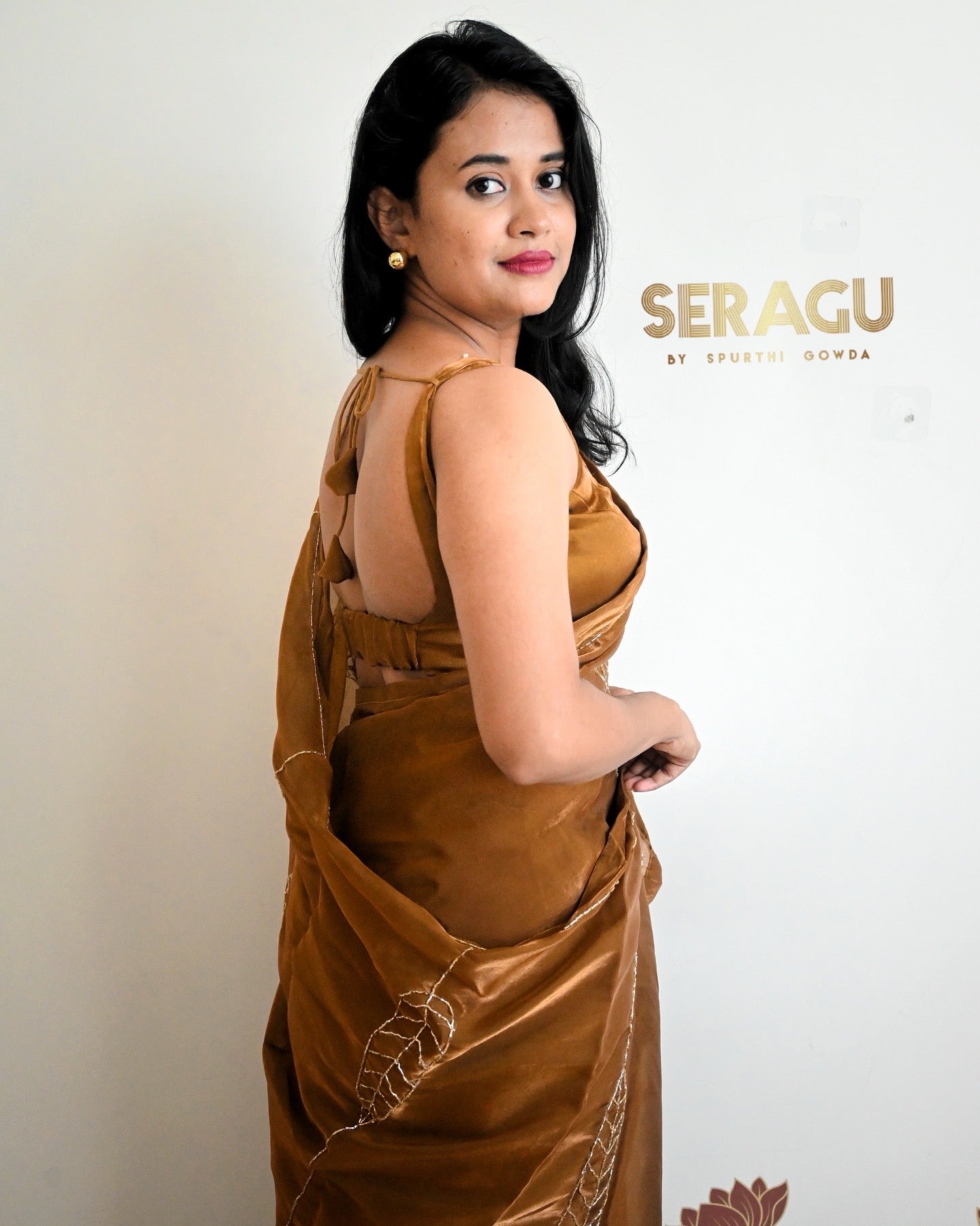 Designer party wear bronze metallic tissue silk saree