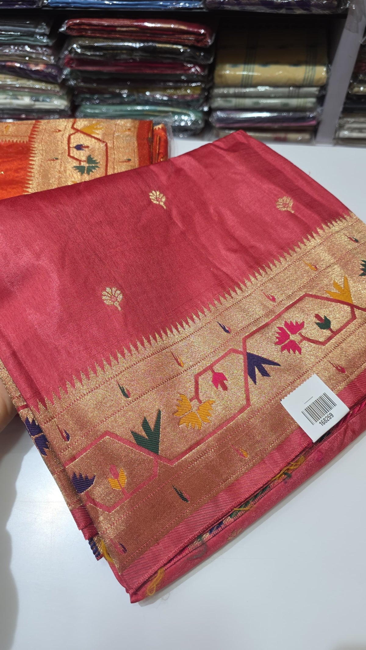 Dola silk saree with paithani border.
