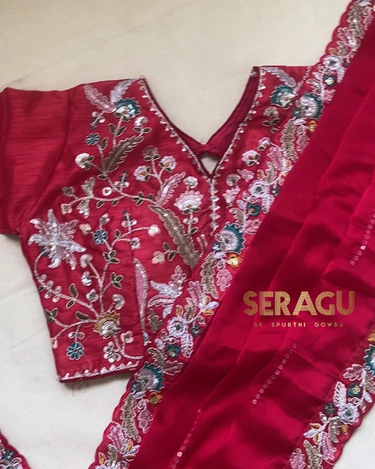 Pure blooming rangoli silk saree with stitched blouse.