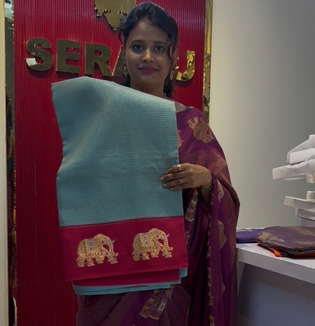 Vintage semi crepe silk saree with elephant butta border