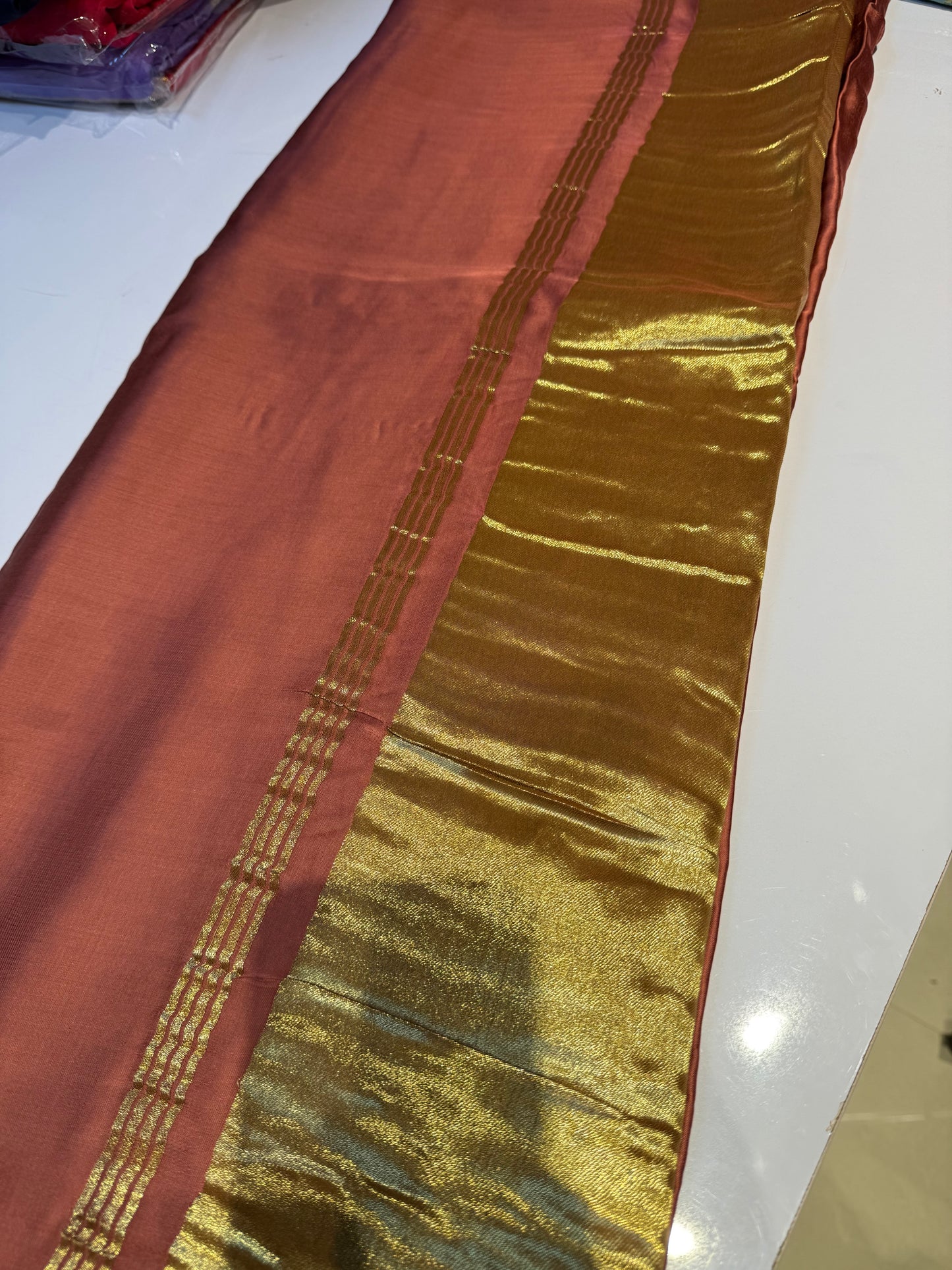 Peach pure plain modal silk saree with lagadi pallu