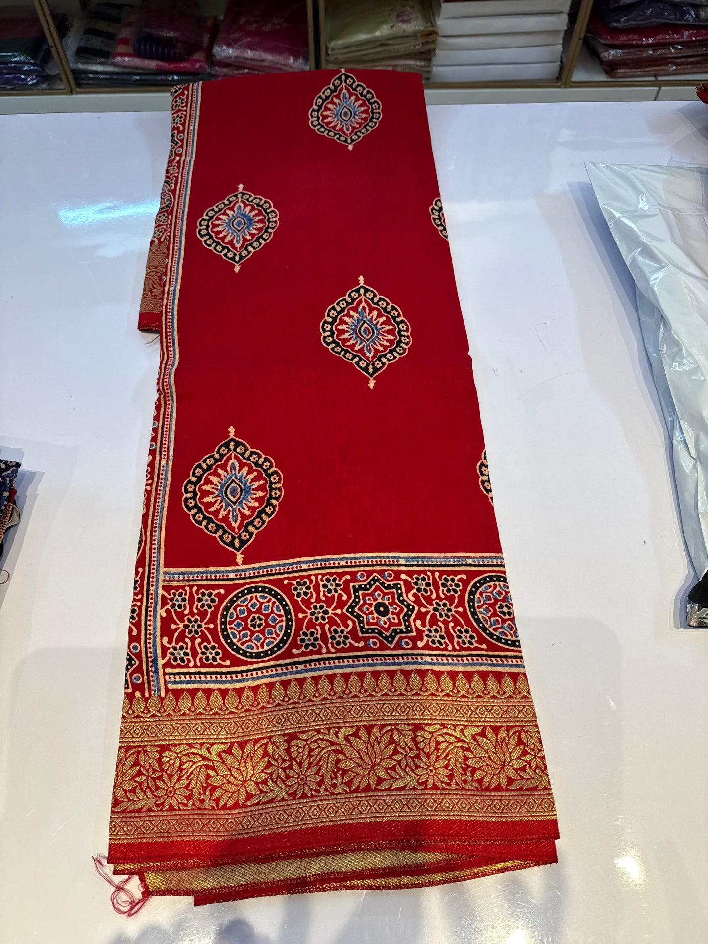 Dola Silk Saree with ajrakh hand block print