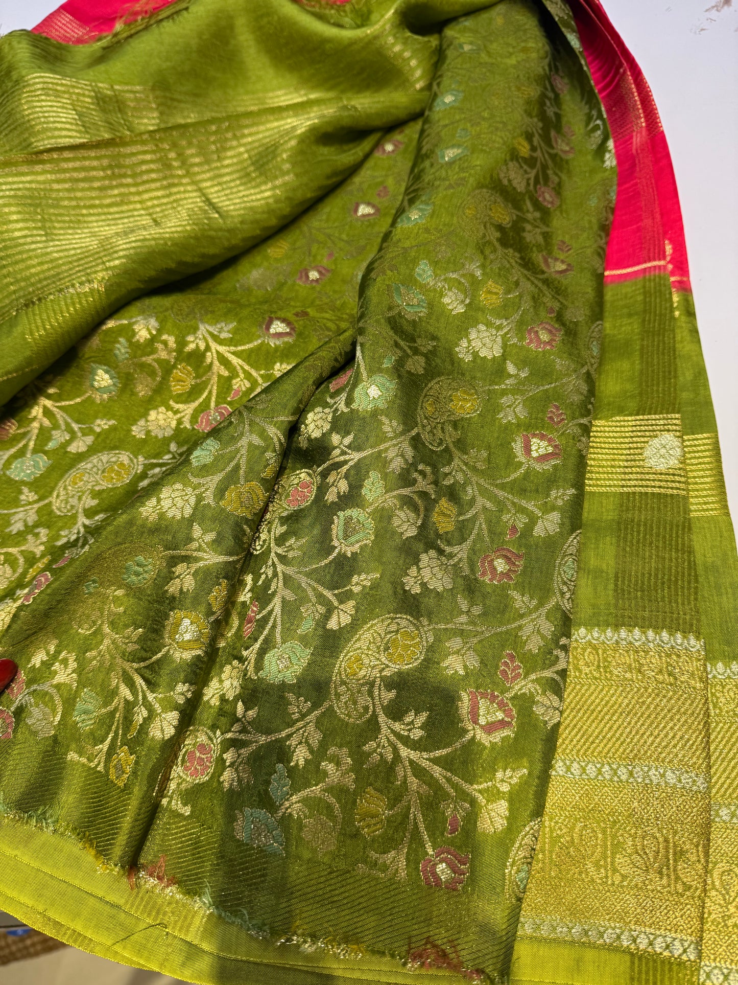 Pinkish red with parrot green premium crepe silk saree