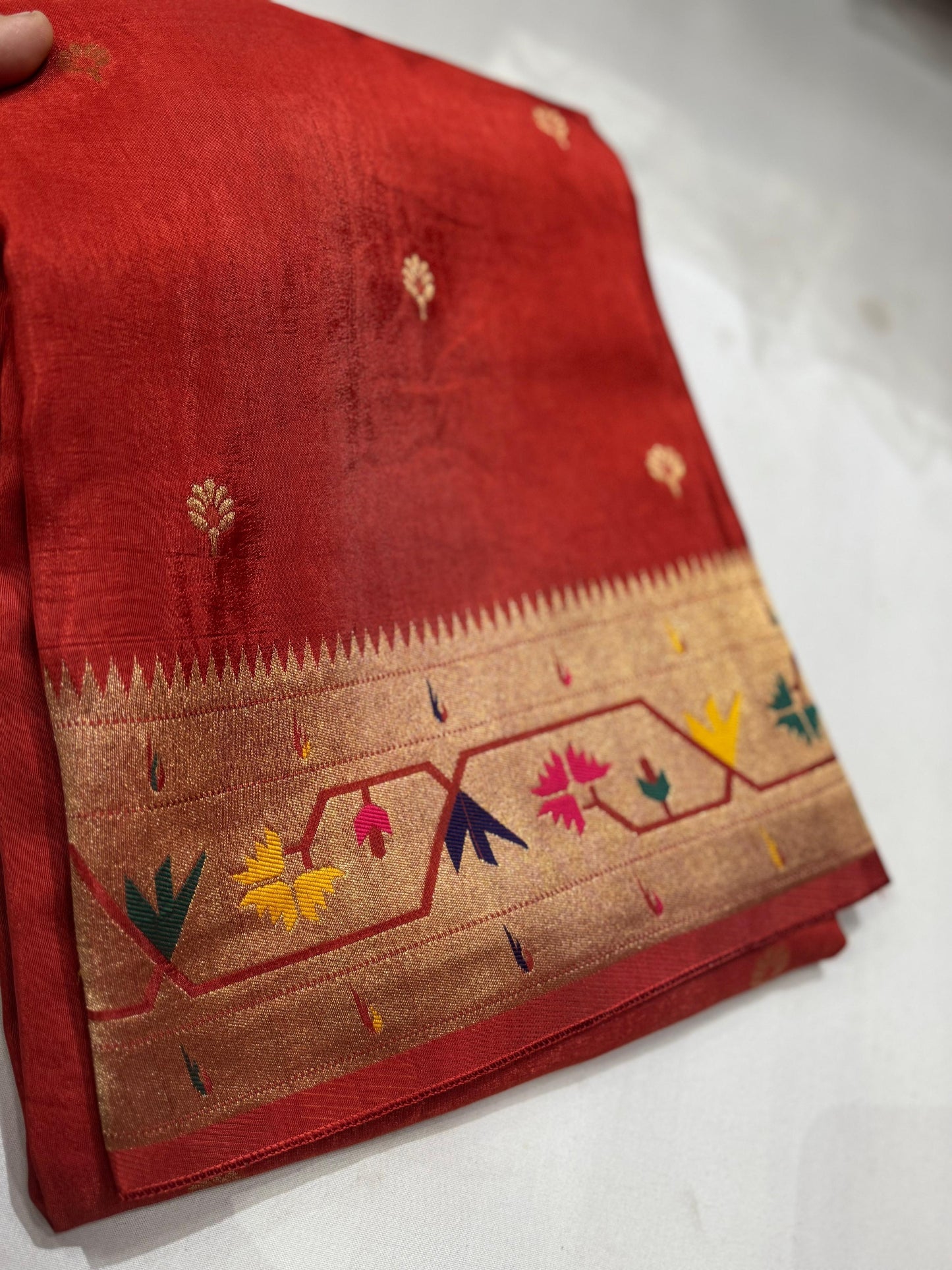 Orange dola silk saree with paithani border.