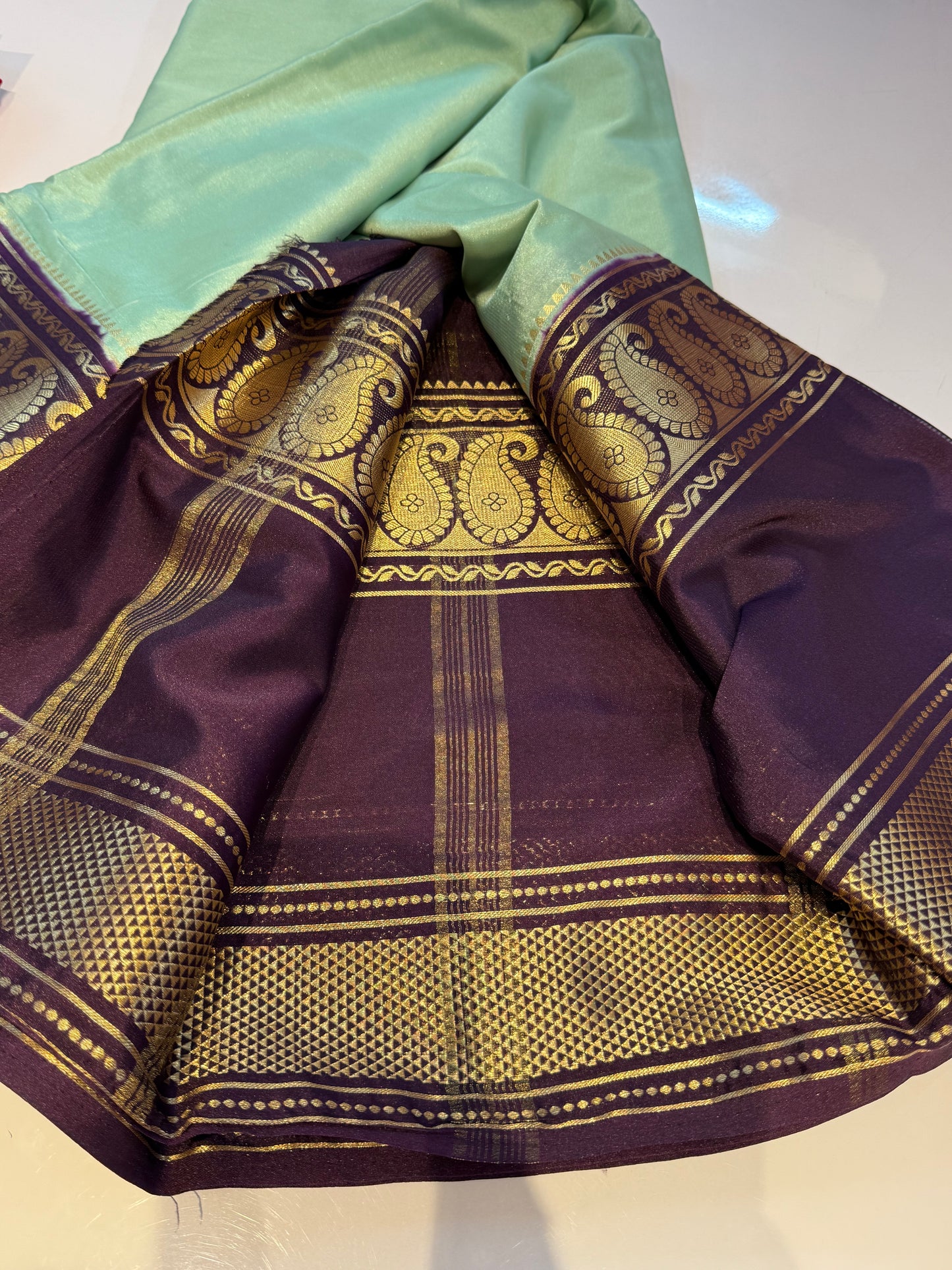 Aqua blue with purple Semi crepe mango bentex border saree