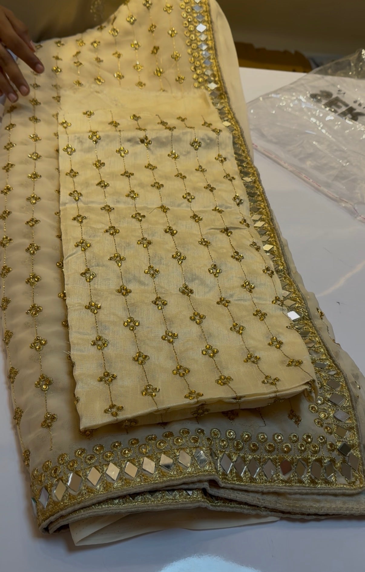 Mirror embroidery cream saree