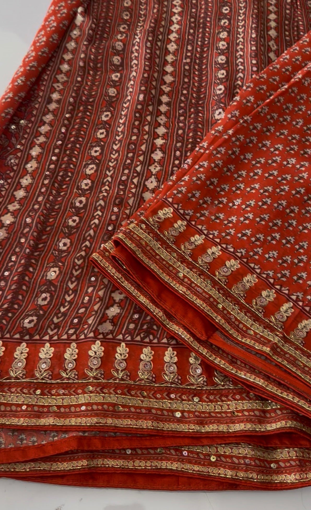 Orange Kareena Kapoor inspired hand work georgette saree