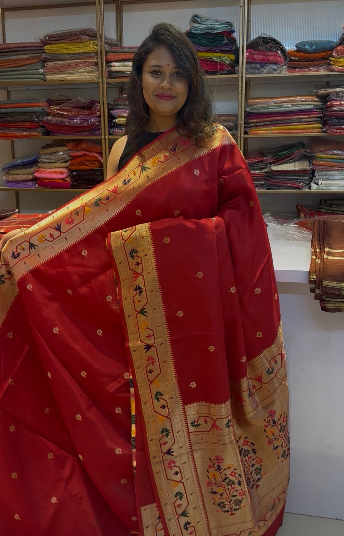 Marron dola silk saree with paithani border.