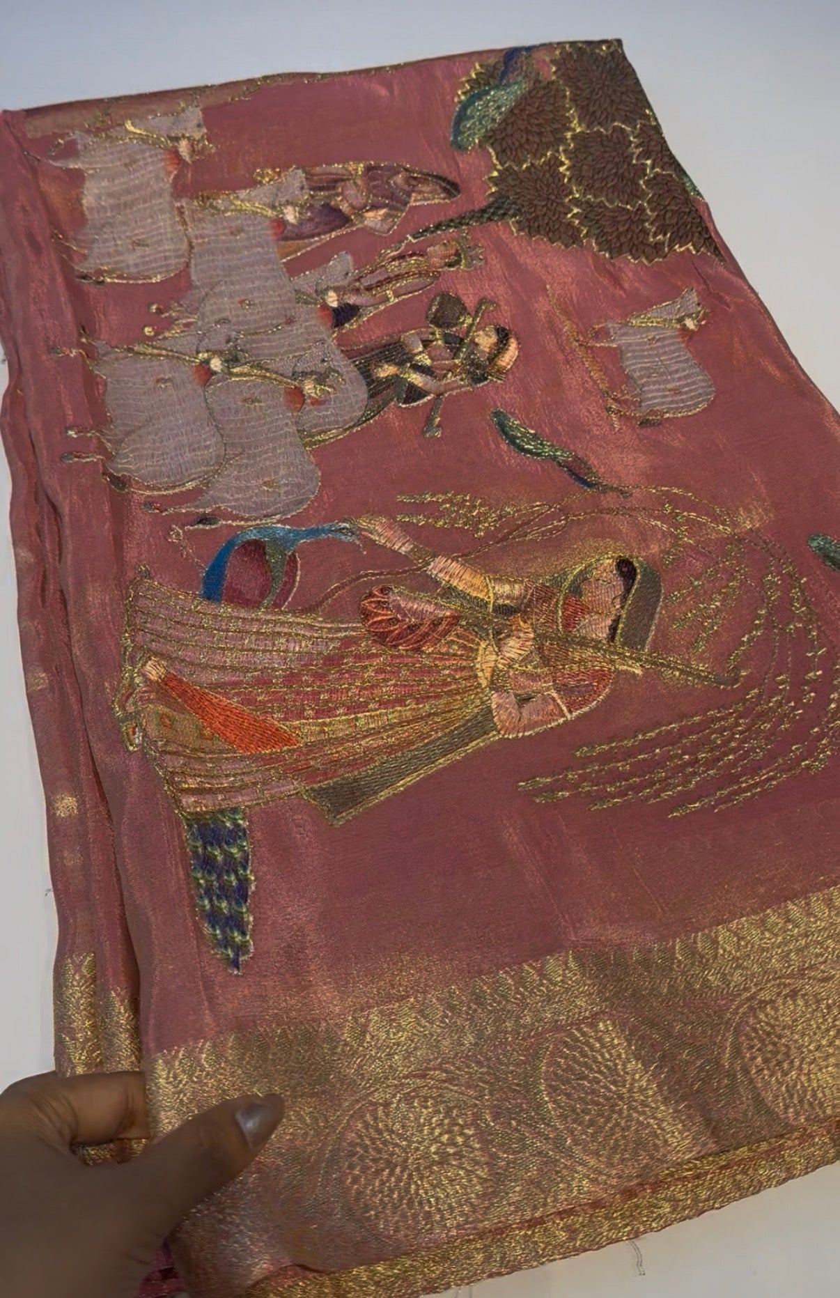 Pink soft tissue silk saree with pichwali concept embroidery design