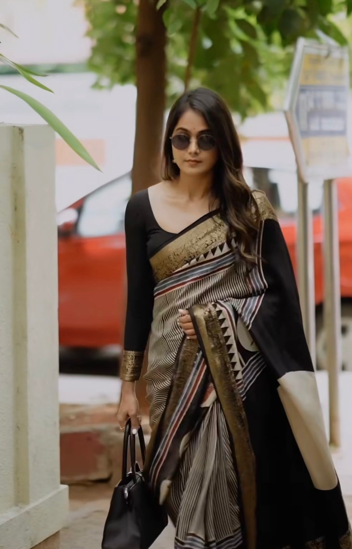 Mokshitha Dola Silk Saree with ajrakh hand block print