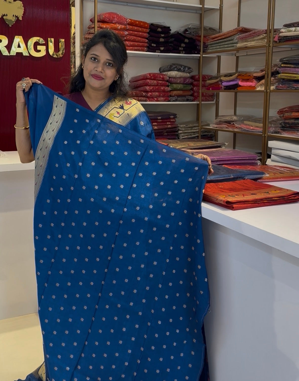 Teal blue dola silk saree with paithani border.