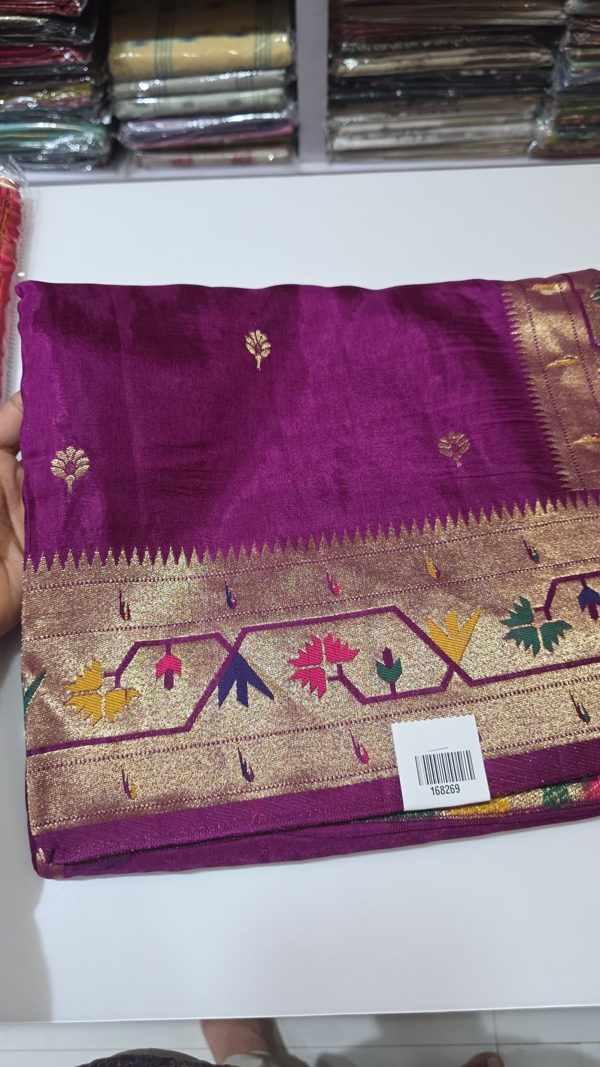 Dola silk saree with paithani border.