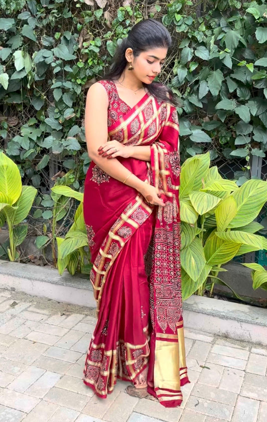 Nethra maroon checked modal silk saree