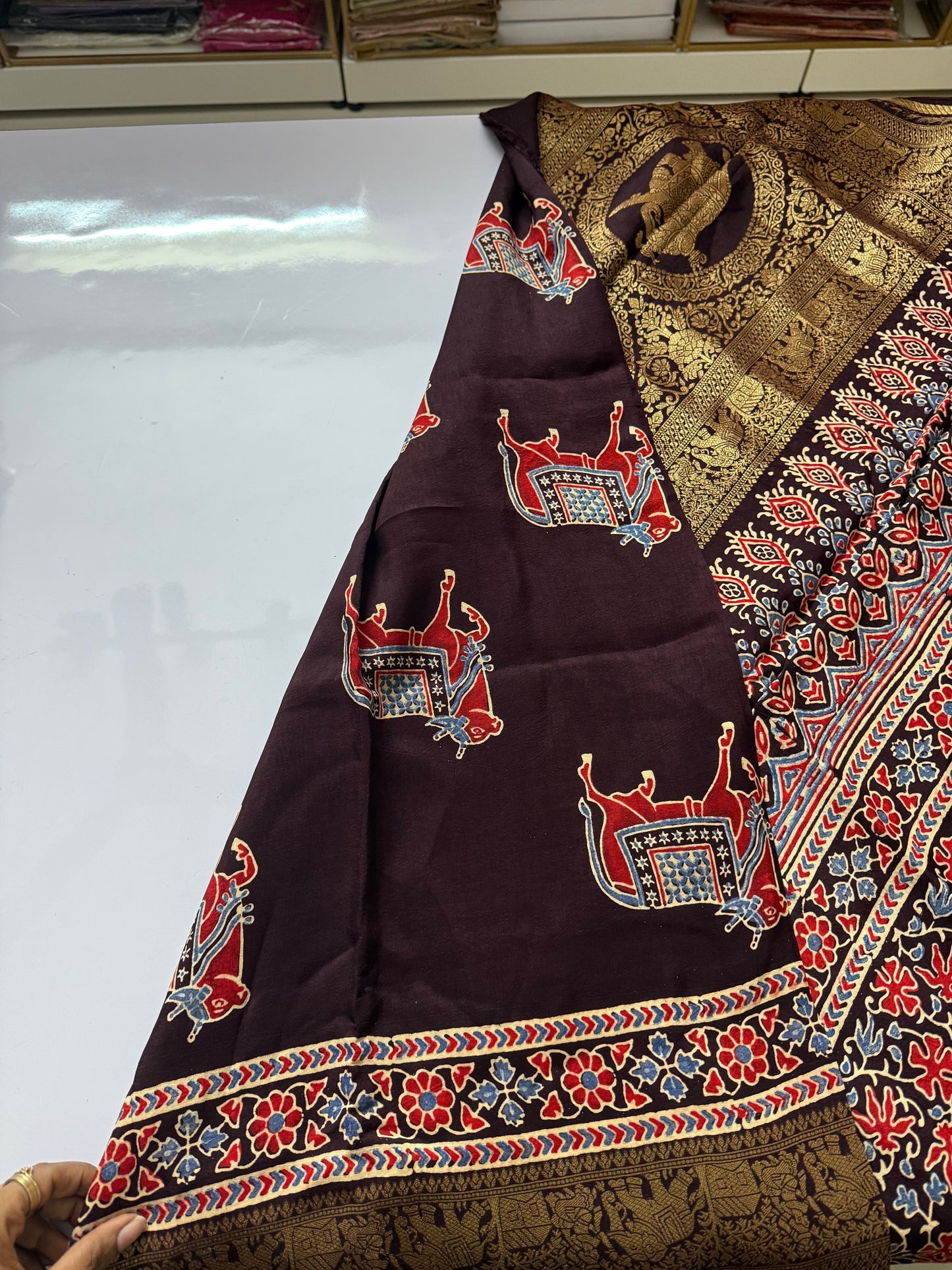 Cow design brown Dola Silk Saree with ajrakh hand block print