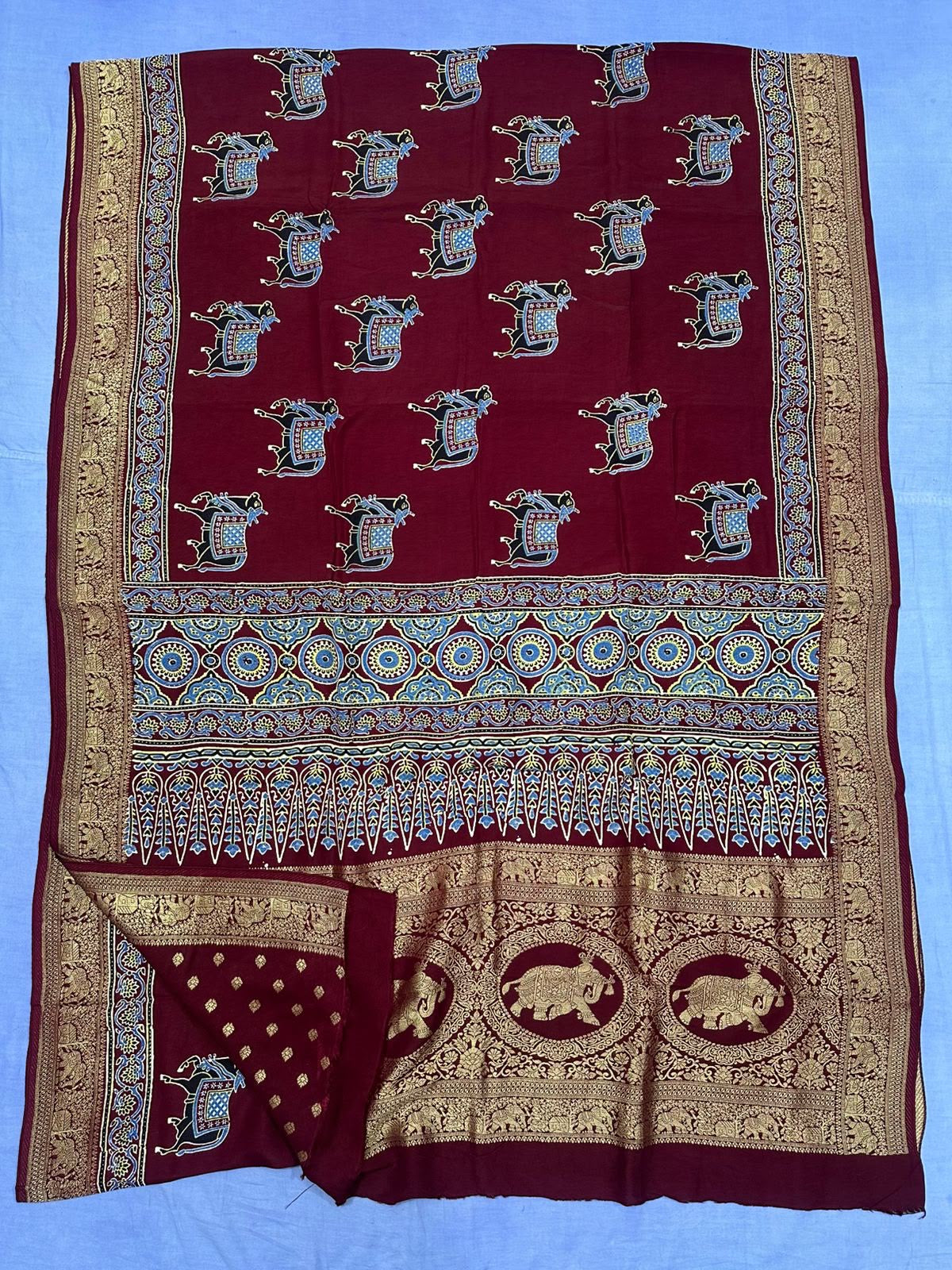 Cow design maroon Dola Silk Saree with ajrakh hand block print