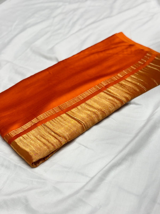 Orange Pure plain modal silk saree with lagadi pallu