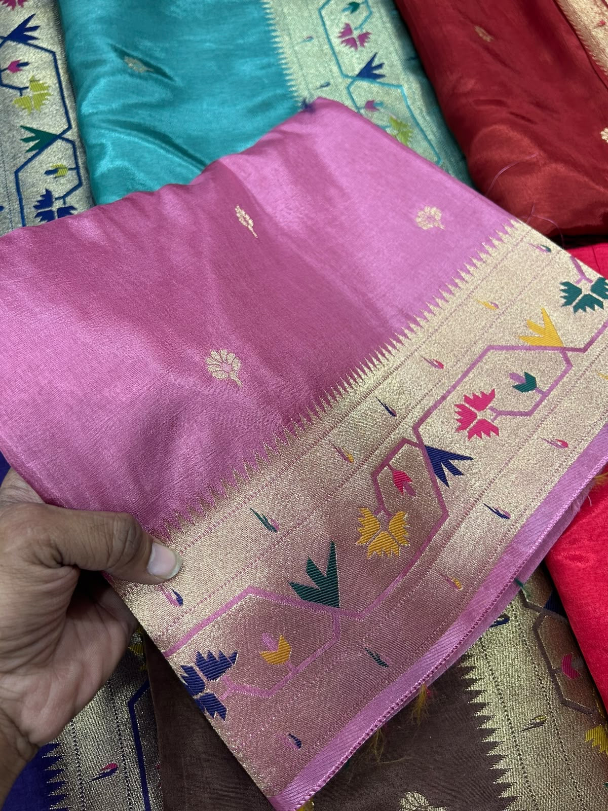 Baby pink dola silk saree with paithani border.