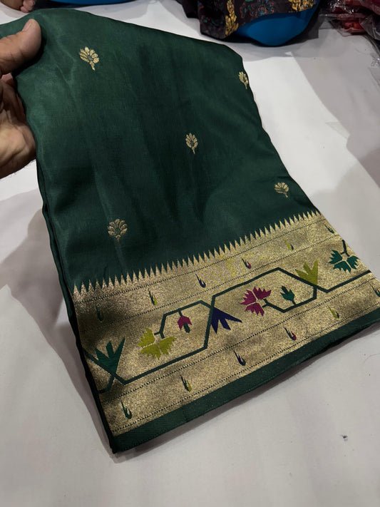 Green dola silk saree with paithani border.