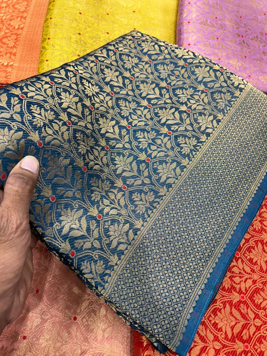 Premium brocade crepe Banarasi saree where rich weaving meets effortless drape-luxury that fits your budget.