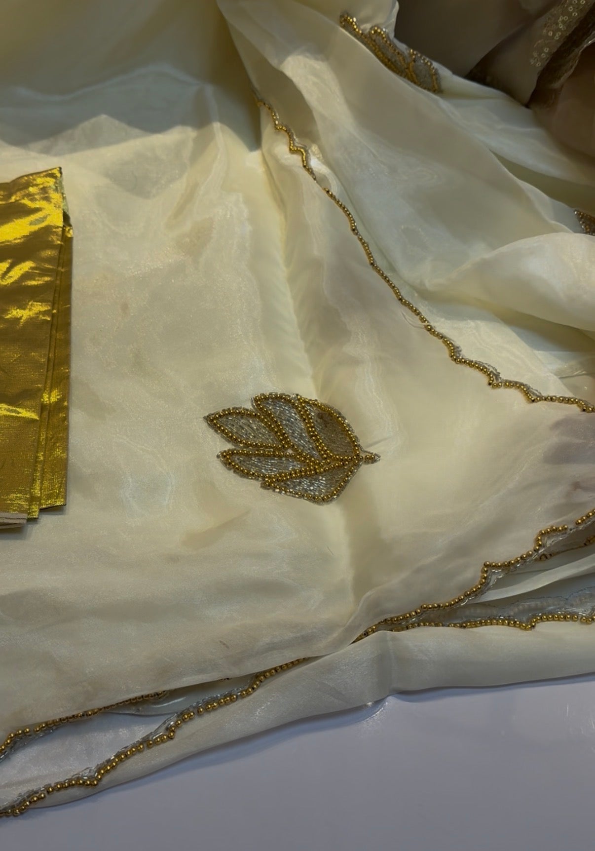 White and gold handwork saree