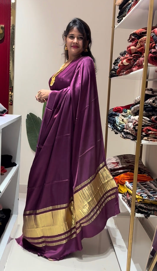 Purple pure plain modal silk saree with lagadi pallu