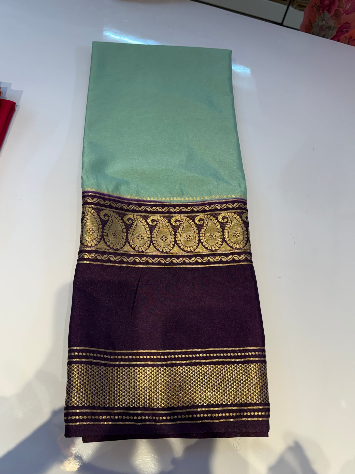Aqua blue with purple Semi crepe mango bentex border saree