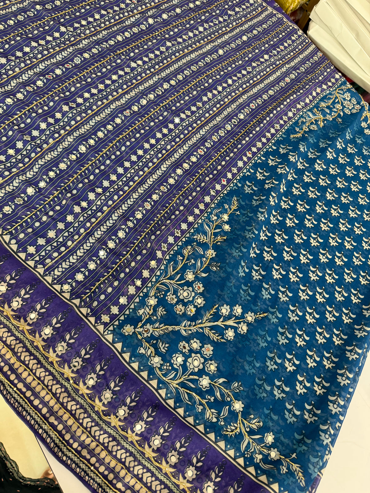 Dual shade Soft georgette Kardana and real mirror work saree hand work.