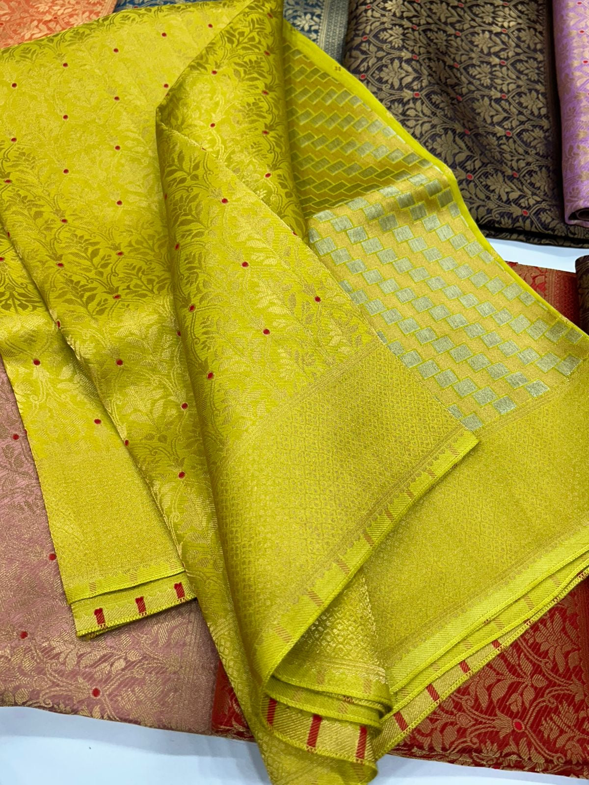 Premium brocade crepe Banarasi saree where rich weaving meets effortless drape-luxury that fits your budget.