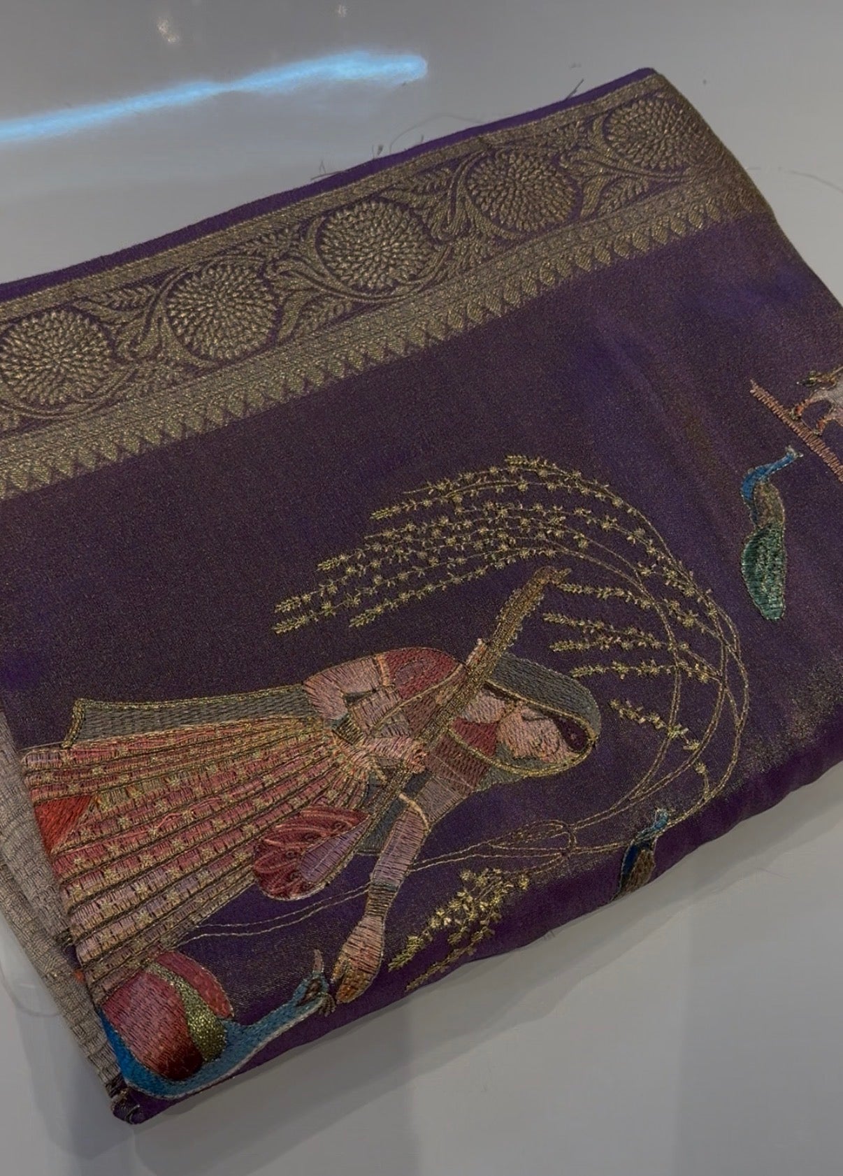 Lavender soft tissue silk saree with pichwali concept embroidery design