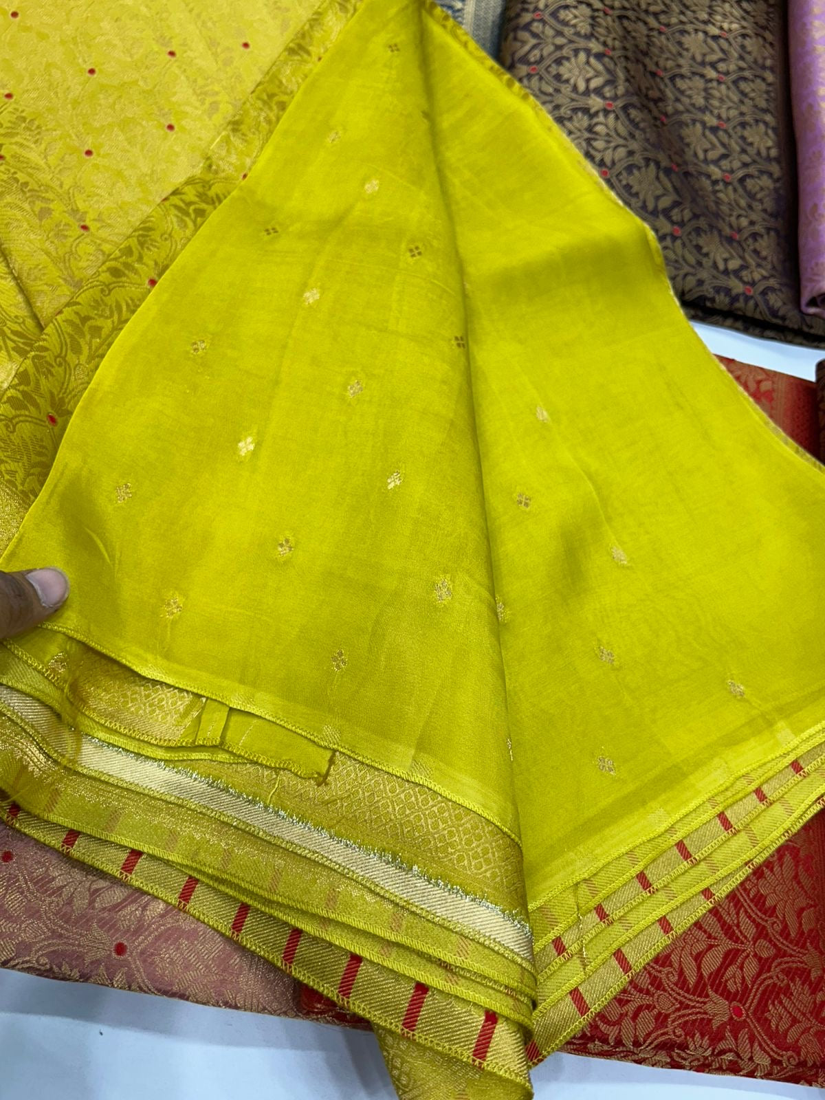 Premium brocade crepe Banarasi saree where rich weaving meets effortless drape-luxury that fits your budget.