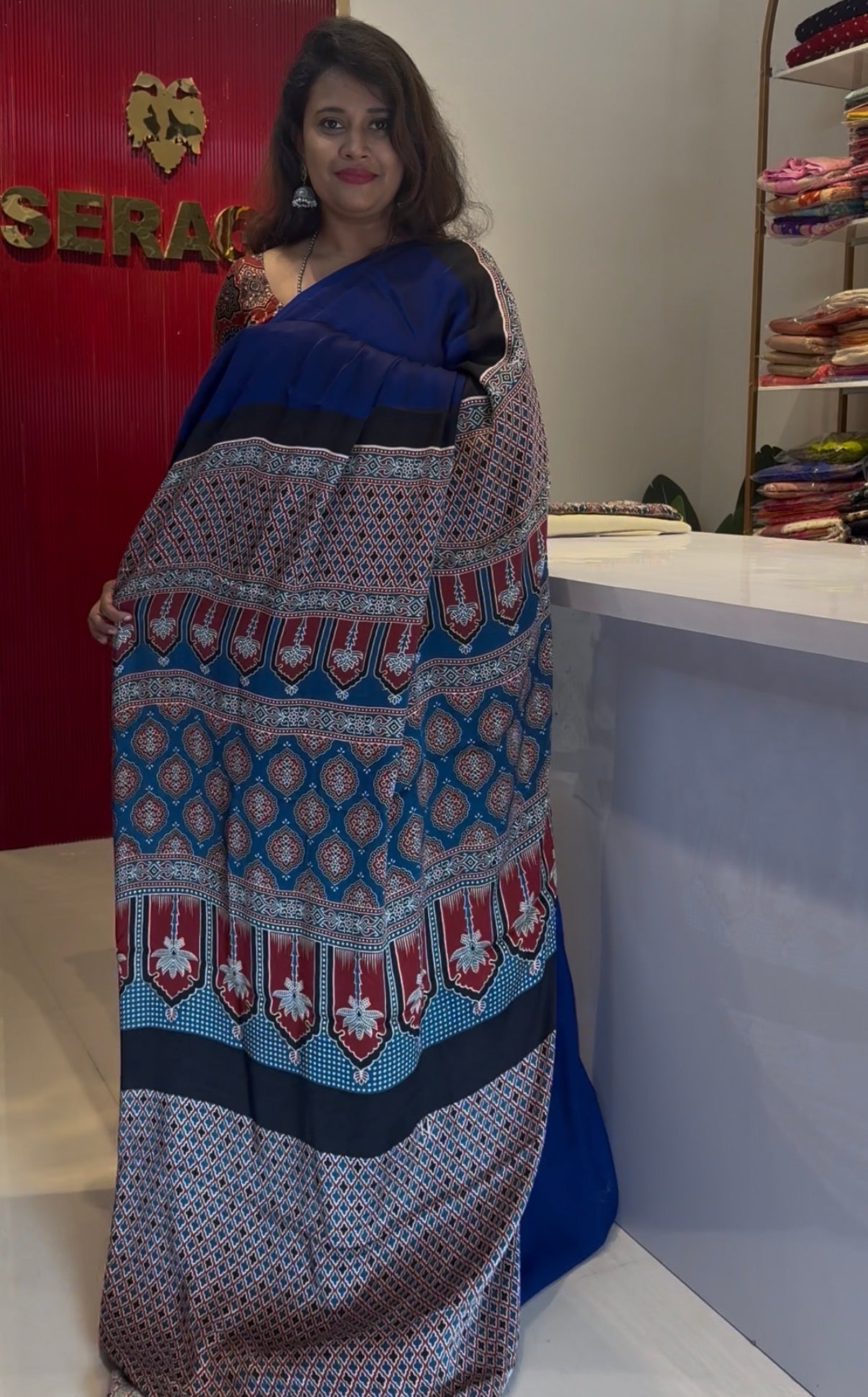 Blue pure modal silk saree with ajrakh hand block print pallu and blouse