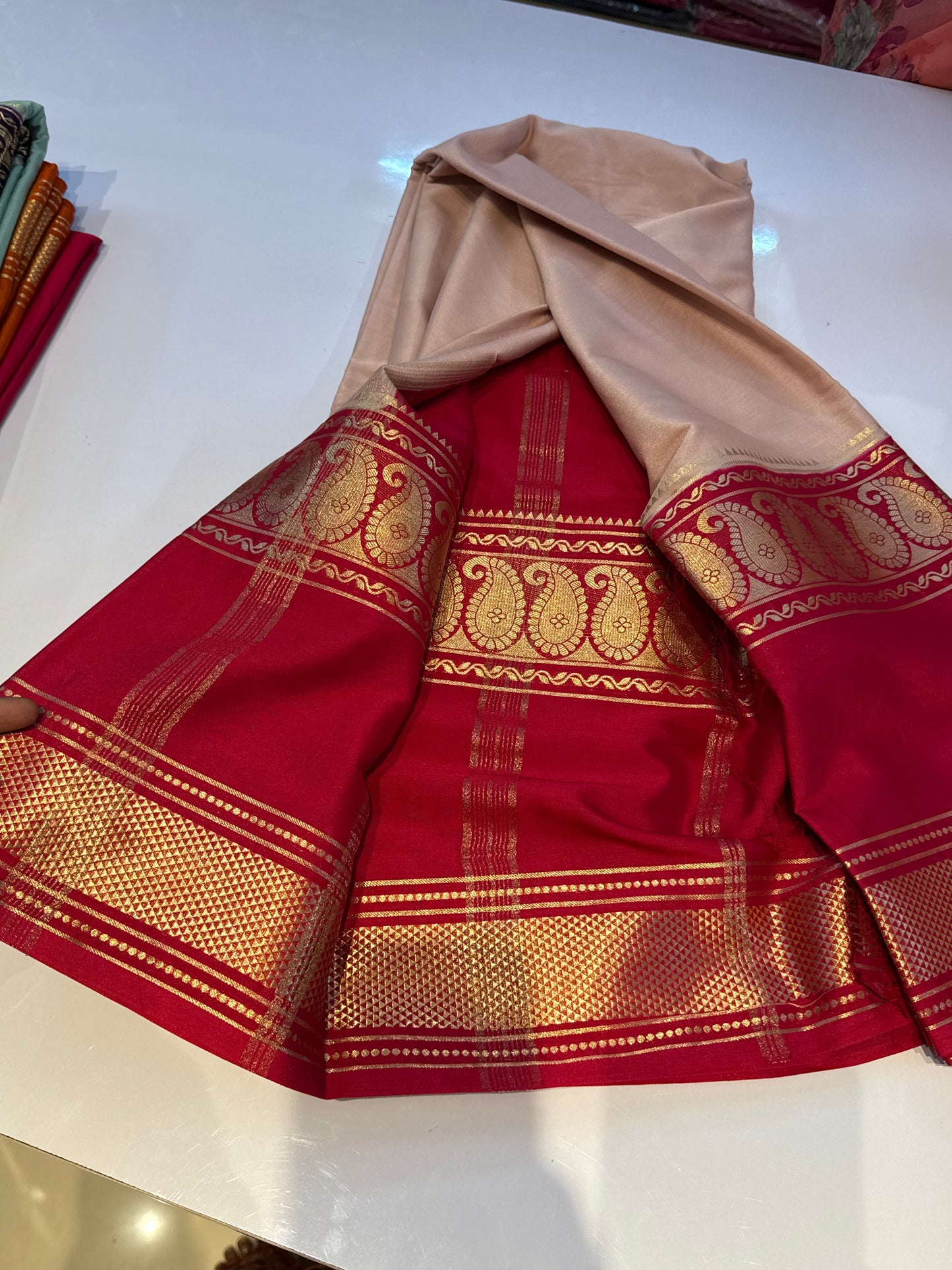 Peach with hot pink Semi crepe mango bentex border saree