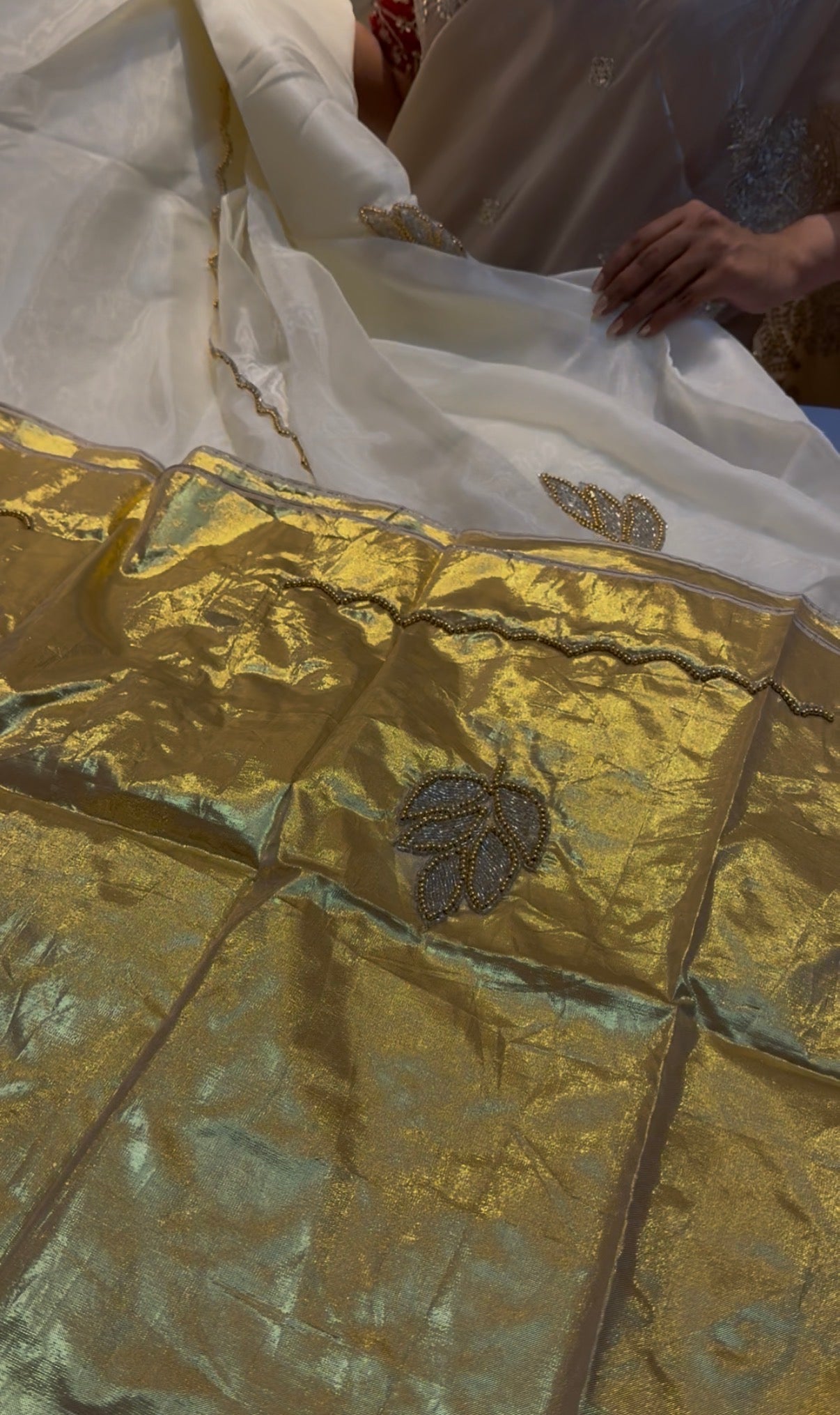 White and gold handwork saree