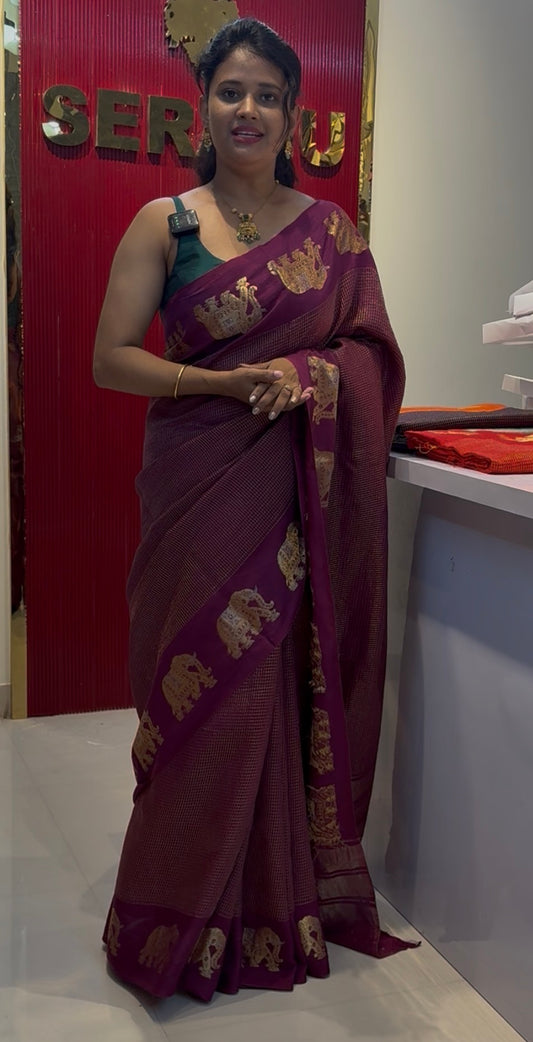Vintage semi crepe silk saree with elephant butta border
