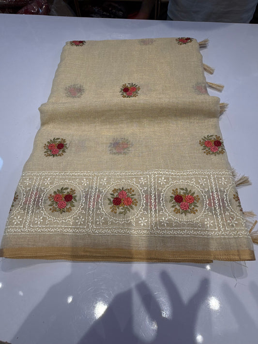 Premium Tissue Linen Saree featuring elegant floral Persian embroidery on the border and pallu, beautifully complemented with intricate traditional Chikankari work. A graceful blend of timeless craftsmanship and understated elegance.
(tissuelinen100)