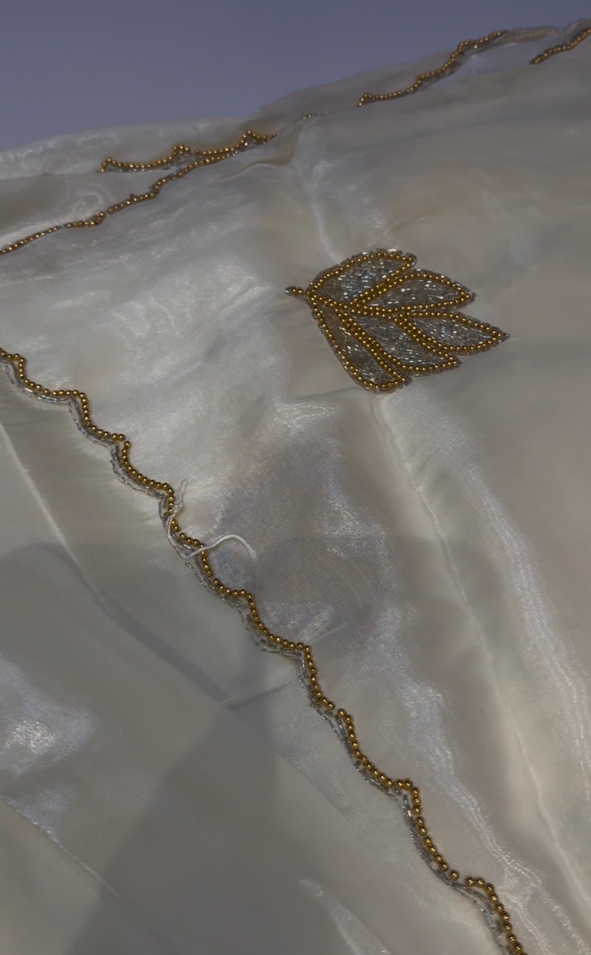 White and gold handwork saree