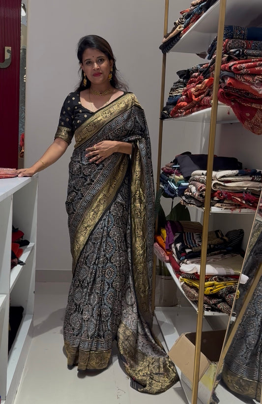 Black badam butta premium Dola Silk Saree